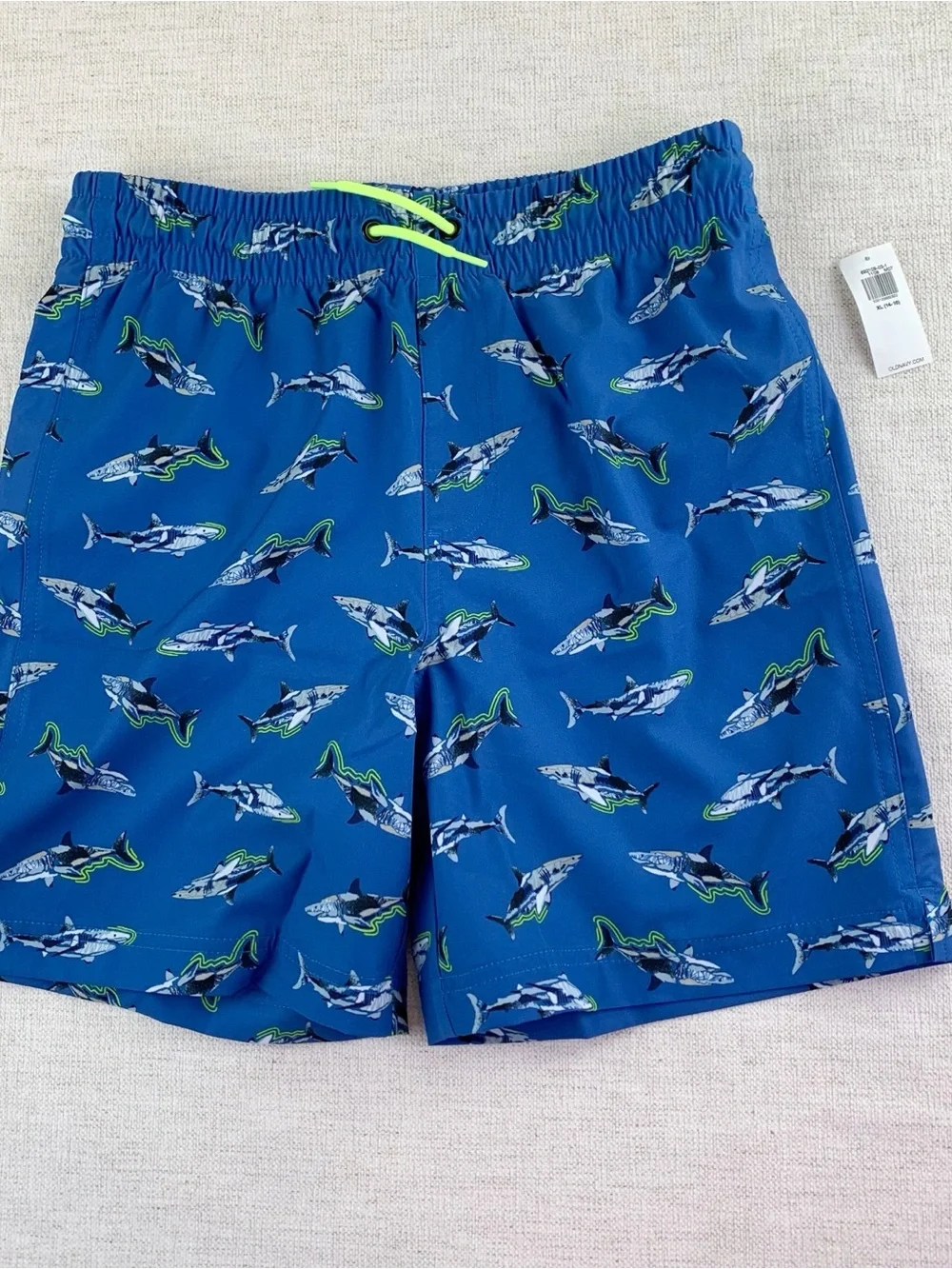 Old Navy New Boy's shark swim trunks in blue size XL